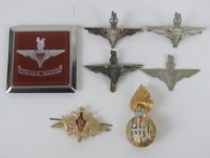 A quantity of assorted British Paratrooper badges inc cap badges. Seven items.