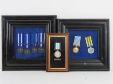 A framed South Atlantic medal. 1 x framed of 2 x British korean campaign medals.
