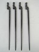 Four Mosin Nagant bayonets.