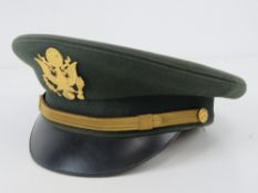 A WWII US Army Officers peaked cap bearing label for Bancroft, military caps, imported fur felt,