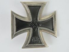 A reproduction WWII German Iron Cross medal.