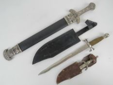 A contemporary dagger having skull head pommel and wire bound grip together with a contemporary