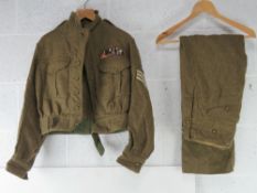 A Para Badged British uniform with insignia, Battledress Blouse dated 1956 size 10.