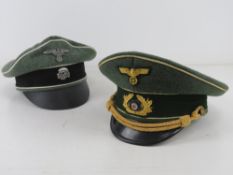 Two reproduction WWII German Officers Caps.