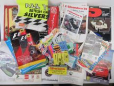 A quantity of race programmes, passes, marshal bibs etc.