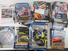 A quantity of race programmes, passes, marshal bibs etc.