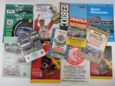 A quantity of race programmes, passes, marshal bibs etc.