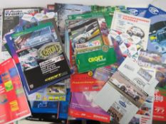 A quantity of race programmes, passes, marshal bibs etc.