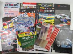 A quantity of race programmes, passes, marshal bibs etc.