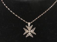 A silver filigree Maltese Cross pendant,