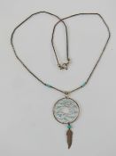 A Native American dream catcher necklace