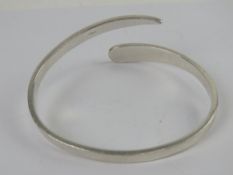 A substantial HM silver bangle - larger