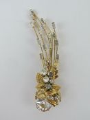 A large contemporary floral spray brooch, unnamed, in Monet box.