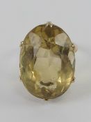 A large and impressive citrine cocktail ring, having indistinct hallmark,