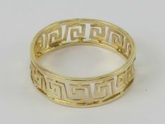 A 14ct gold Greek Key pattern ring, size J, stamped 585, 1g.