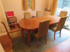 A fine c1930's Art Deco extending half veneered walnut dining table, having single leaf,