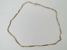 A 9ct gold tri-colour flattened curb link chain necklace, hallmarked 375, 42cm in length, 4g.