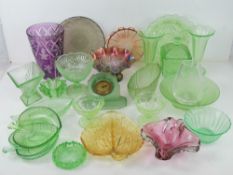 A large quantity of assorted coloured glass and art glass inc Art Deco frosted green glass clock,