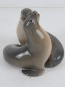A Royal Copenhagan figurine of two sea lions number 2519.
