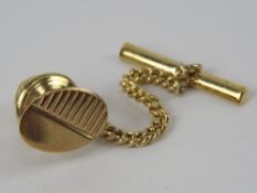 A 9ct gold tie pin, hallmarked 375, having plated receiver.