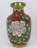An early 20thC Chinese cloisonné Canton enamel bud vase having pink and blue floral decoration upon,