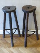 A pair of 1960s black forest type high tripod stools,