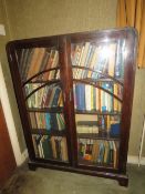 A c1930s twin door Art Deco glazed cabinet or bookcase, 90 x 25 x 125cm.