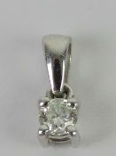 A 9ct white gold and diamond solitaire pendant, round cut diamond approx 2.8mm dia (0.