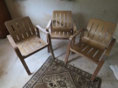 A set of four retro stylised steamed bentwood slatted chairs. Cushions deficient.