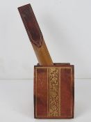 Liberty of London; a leather covered letter opener and desk tidy,