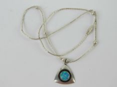 A 925 silver and opal pendant of geometric form on a Native American style beaded chain.