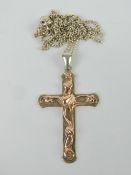 A Clogau gold and silver 'Tree of Life' crucifix with original silver chain.