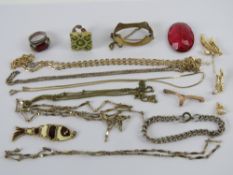 A small quantity of assorted costume jewellery inc brooches,