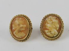 A pair of 9ct gold carved shell cameo earrings, hallmarked 375.