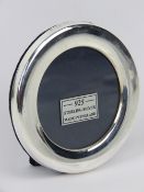 An HM silver photograph frame, overall 9.5cm dia.