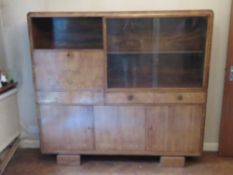 A good Art Deco offset cabinet comprising open shelf,