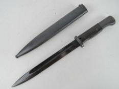 A Yugoslavia Mauser bayonet with scabbard, numbered 2161 and W.K.G.
