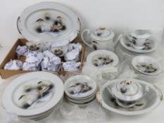 A Japanese tea and dinner service having hand painted scenes upon and marked to back Kutami.