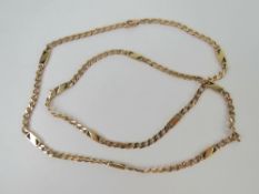 A substantial and unusual 9ct gold necklace having sections of curb link chain separated by