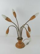 A c1960s table lamp having six sconces of floral form, approx 53cm inc bulb. For re-wiring.