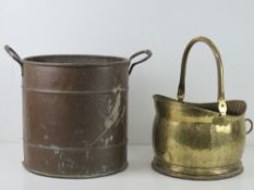 A copper coal bucket, 32cm dia with brass end handles,