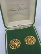 A pair of yellow metal stud earrings, possibly Indian, a/f.