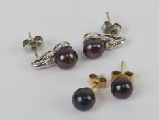 Two pairs of black coloured pearl earrings, one pair being 14ct white gold, hallmarked 585,