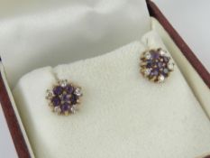 A pair of 9ct gold amethyst cluster stud earrings, hallmarked 375,