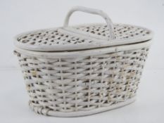 A small white painted vintage picnic bas
