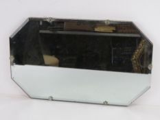 An early 20th C bevel edged octagonal wa