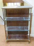 A qualitative brass framed open fronted