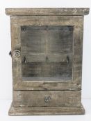 A contemporary rustic effect key cabinet 30cm wide.