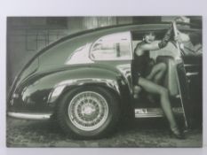 Canvas print; lady in fishnet stockings stepping out of car, 74 x 50cm.