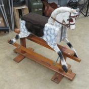 A vintage rocking horse having been naiv